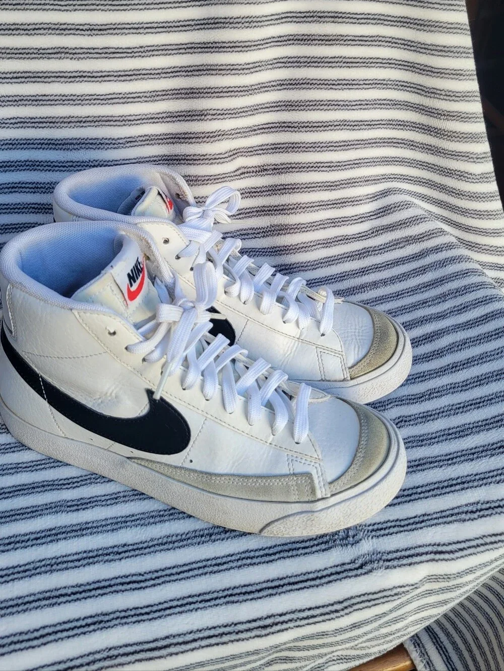 Nike White High-Top Blazers Sneakers with Black Swoosh and Red Tongue Tag